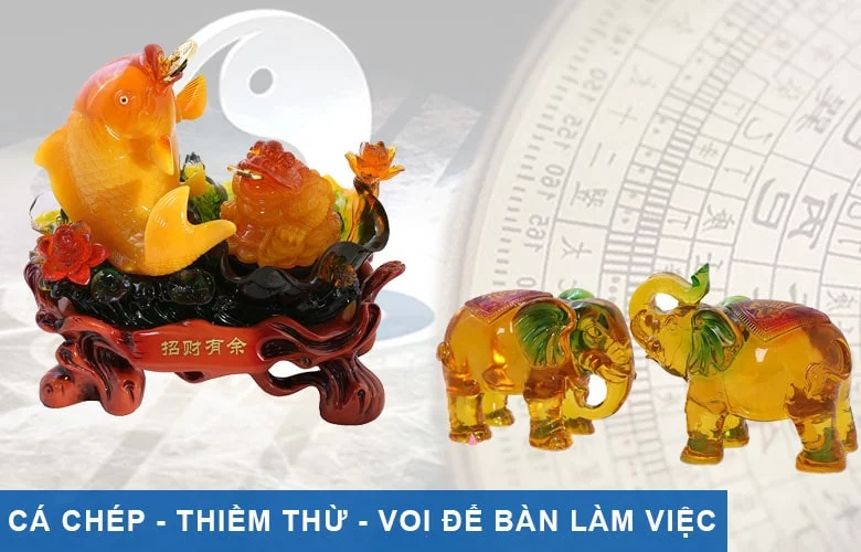 Linh vật cá chép - thiềm thừ - voi đặt trên bàn làm việc